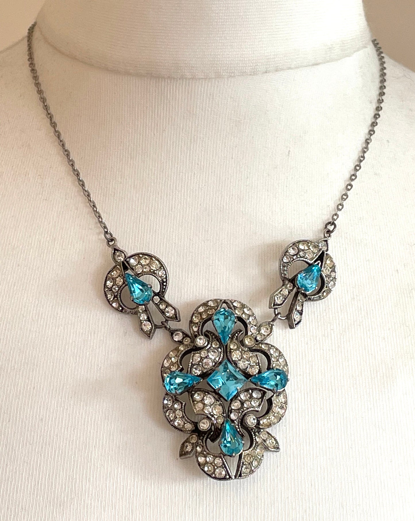 Vintage Art Deco bright turquoise aqua blue and clear crystal paste necklace, brooch and clip-on earrings set, chrome geometric design