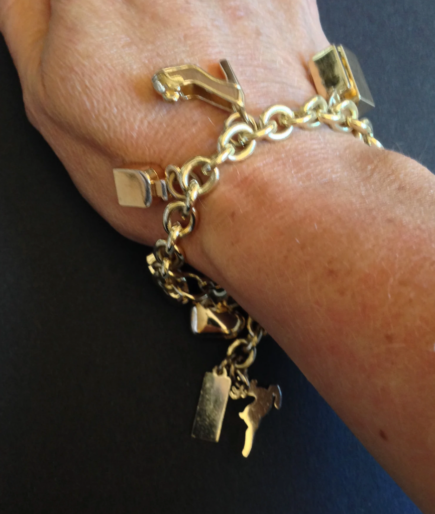 Vintage Dolce and Gabbana D&G heavy gold plated signed designer charm bracelet