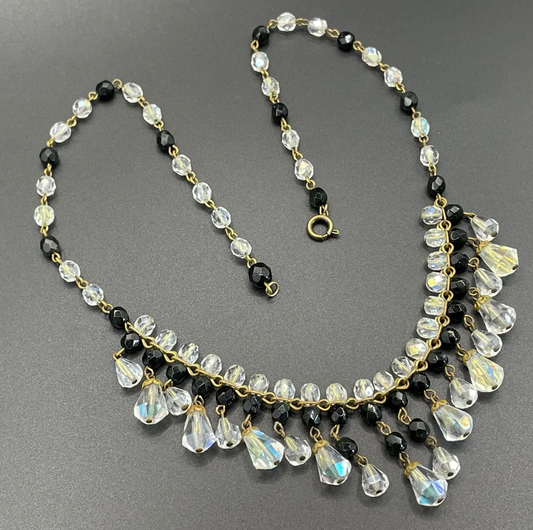 Vintage black and clear aurora borealis crystal faceted cut glass beaded fringe necklace with gold tone, delicate monochrome design