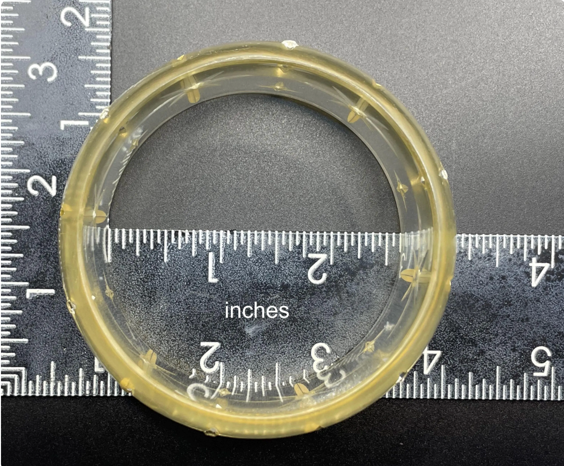 Vintage apple juice coloured transparent plastic wide, engraved bangle, studded with clear glass rhinestones, Art Deco style