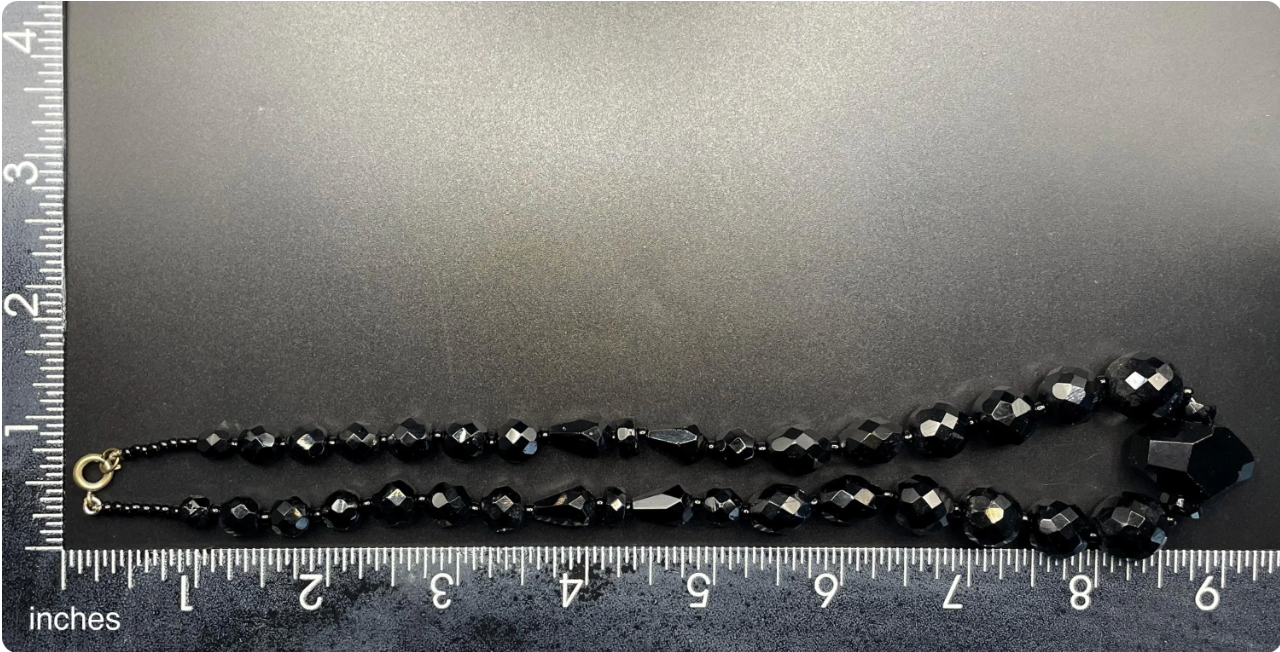 Vintage Art Deco black French jet glass faceted bead necklace with pretty beads in different shapes and sizes