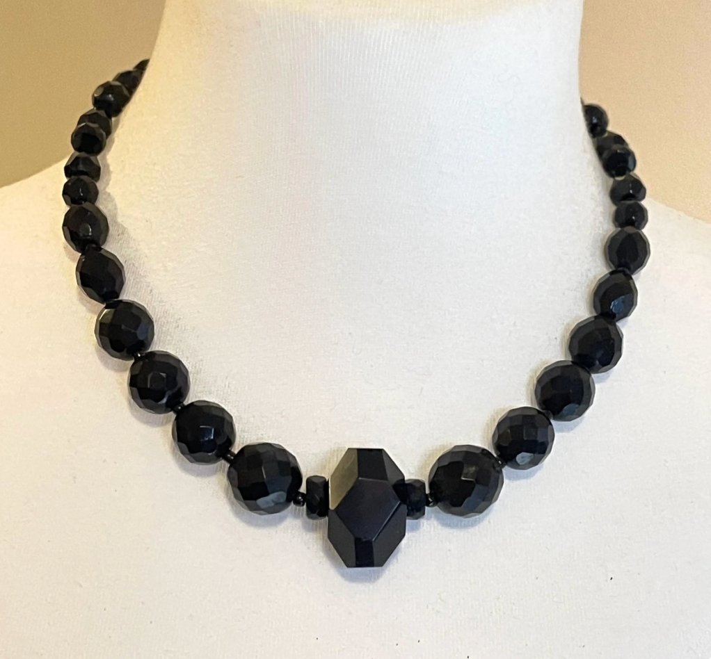 Vintage Art Deco black French jet glass faceted bead necklace with pretty beads in different shapes and sizes