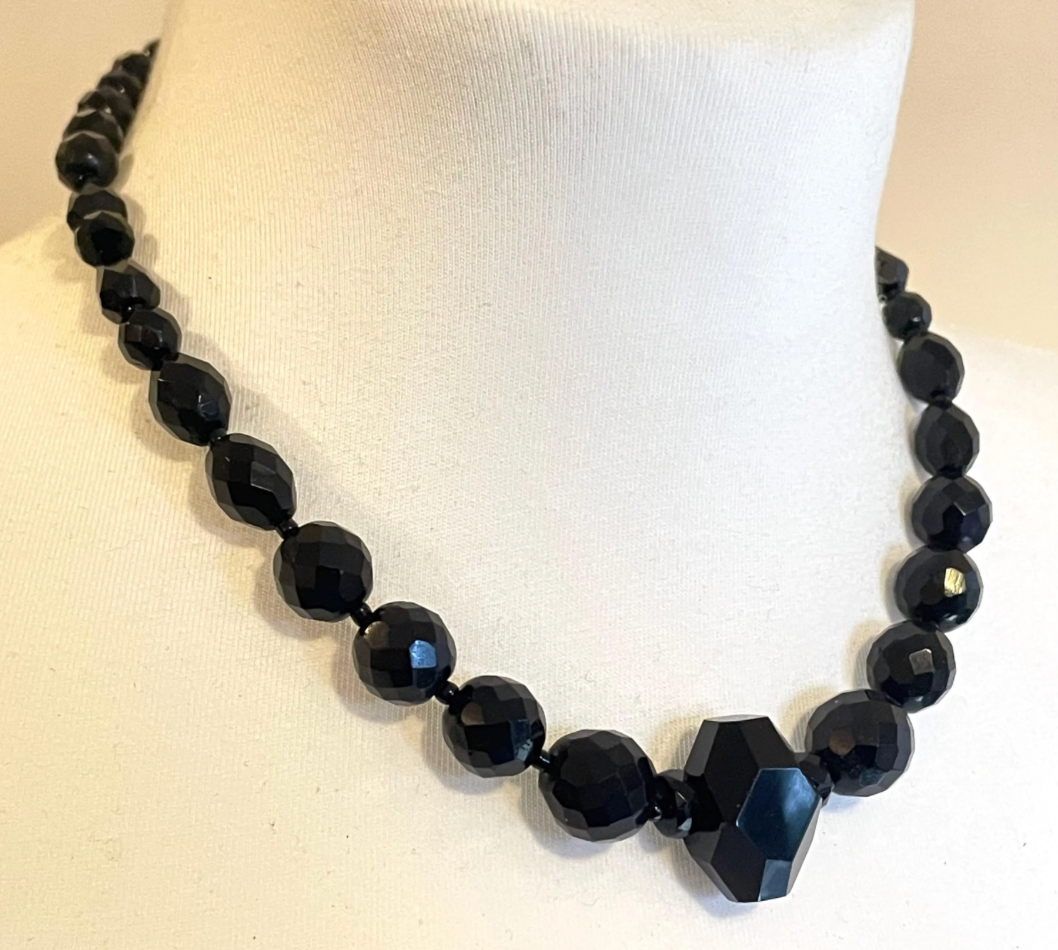 Vintage Art Deco black French jet glass faceted bead necklace with pretty beads in different shapes and sizes