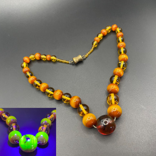 Vintage Louis Rousselet uranium glass Art Deco necklace on foxtail chain - cats' eye UV sensitive and transparent orange beads