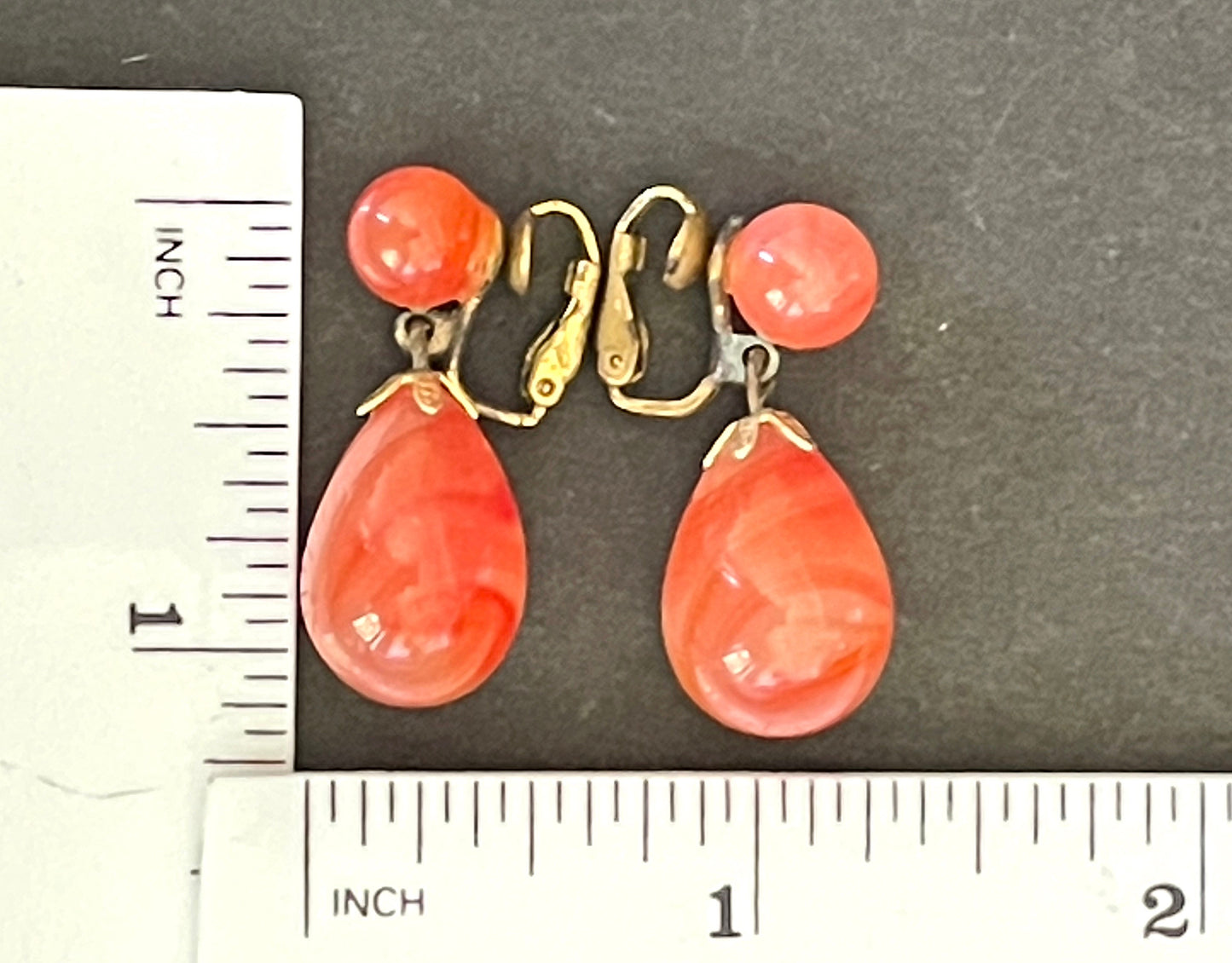 Vintage Art Deco large teardrop glass faux carnelian and gold tone statement clip on earrings, stamped ges gescht