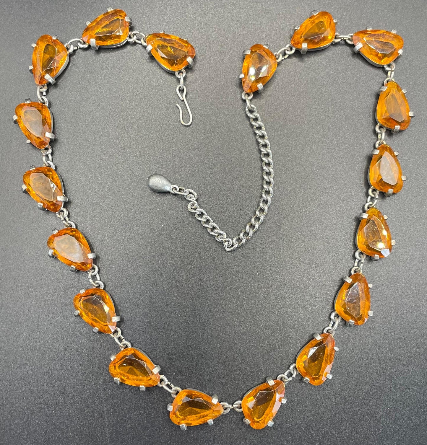 Vintage signed Sphinx citrine yellow / topaz orange glass riviere necklace, triangle shaped crystals set open-backed in silver tone settings