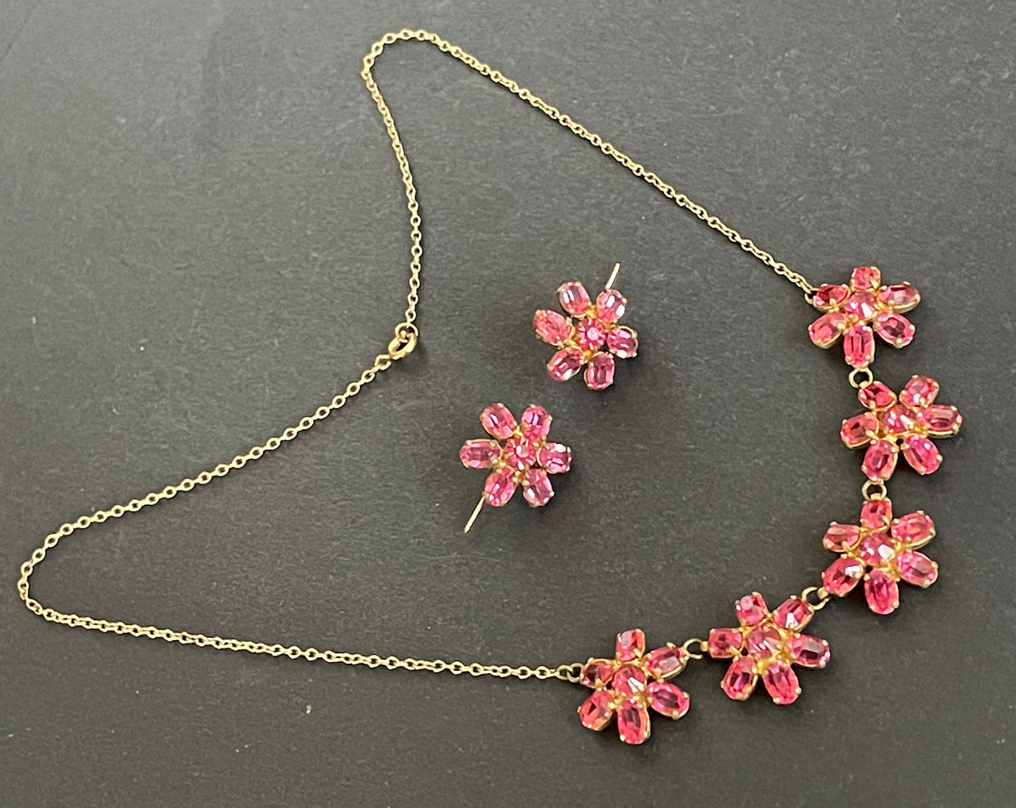 Vintage crystal floral design pink ruby coloured rhinestone necklace and earrings set- bright rhinestones set open-backed in gold tone