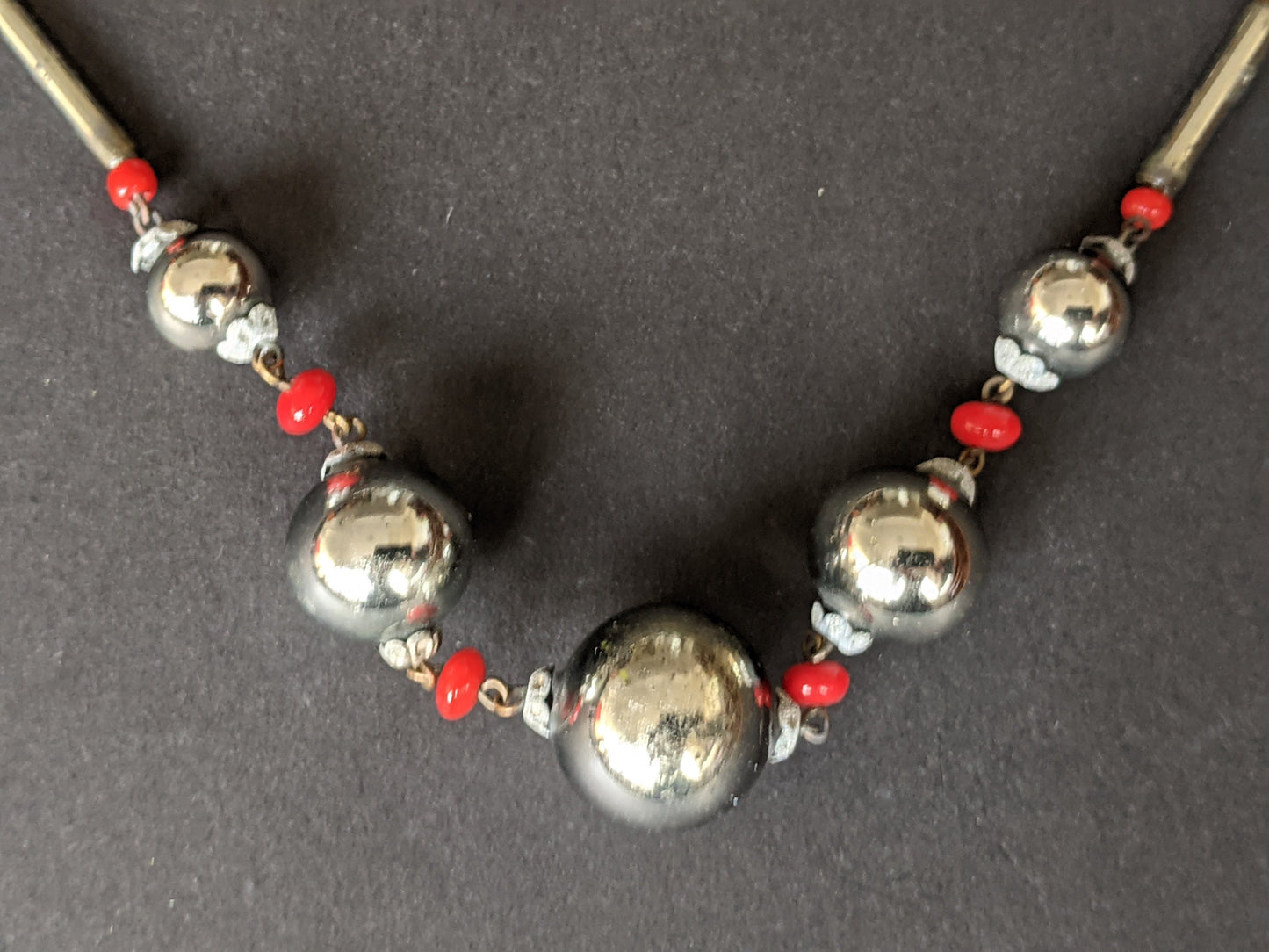 Vintage Art Deco silvered hollow blown glass beads and chrome machine age necklace with red glass accent beads