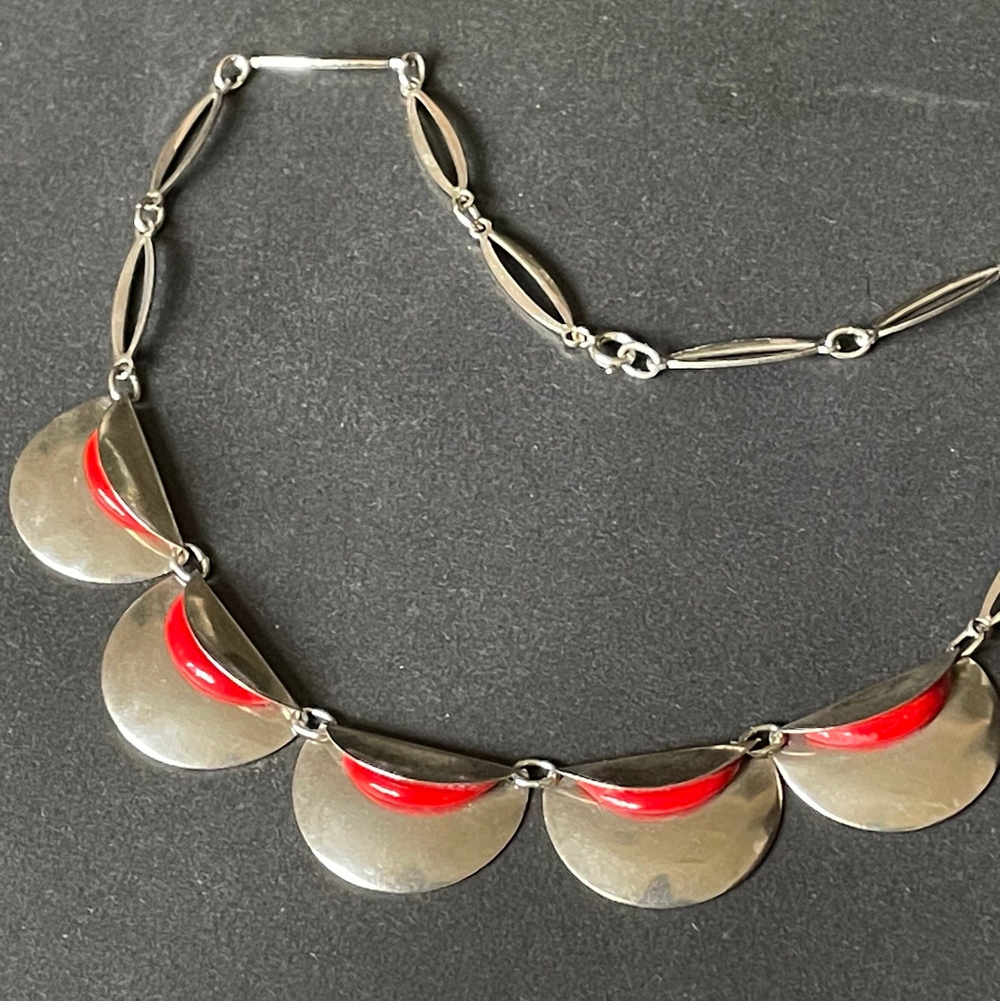 Vintage Jakob Bengel Art Deco machine age necklace, bright red galalith geometric shapes with shiny silver tone chrome folded discs