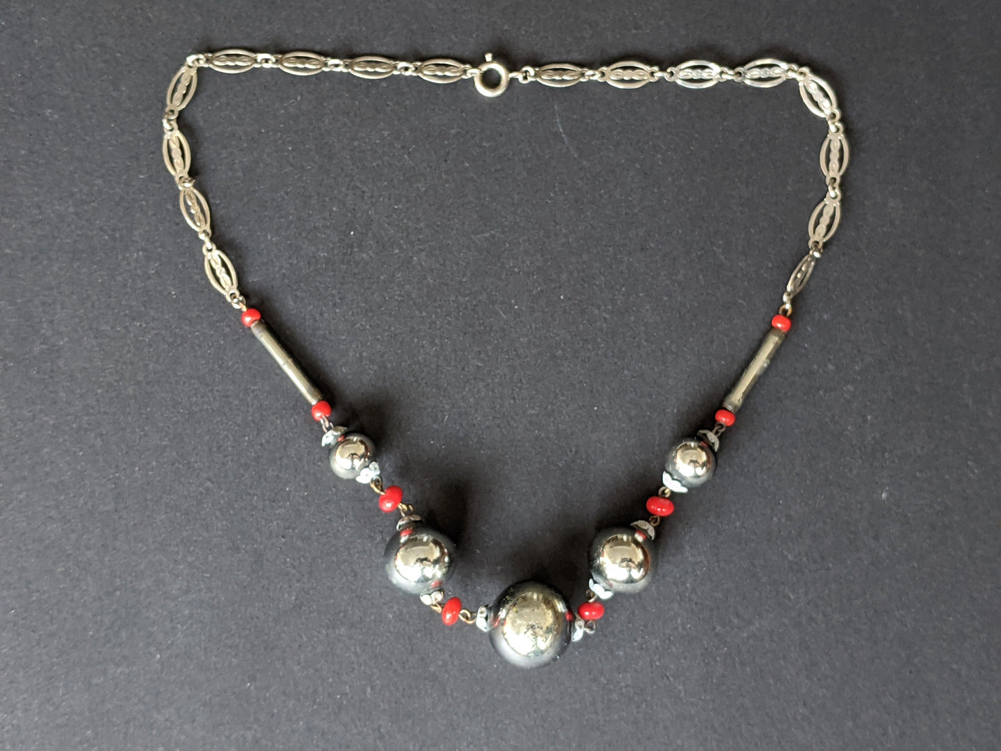 Vintage Art Deco silvered hollow blown glass beads and chrome machine age necklace with red glass accent beads