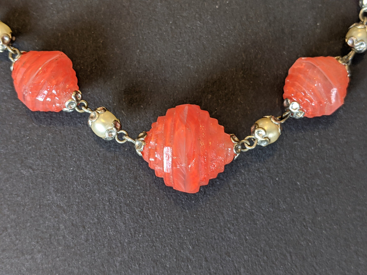 Vintage Art Deco orange Carnelian coloured moulded glass large bead necklace, with glass pearls set in gold tone