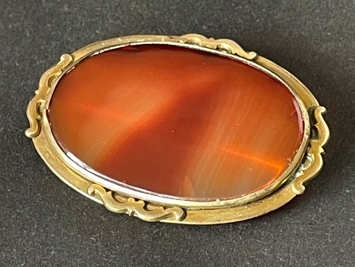 Antique Victorian Scottish style gold or gilt / rolled gold / plated large ornate brooch with huge oval agate stone with gorgeous striations