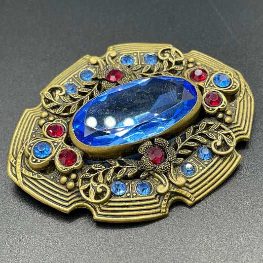 Large vintage Art Deco sapphire blue and bright ruby red rhinestone and ornate gold tone floral design Czech brooch, Neiger style