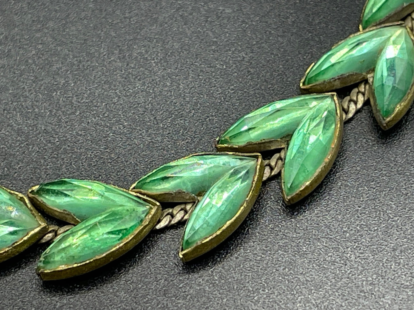 Vintage peridot green moulded Vauxhall style glass leaf design necklace, set in antique brassy gold tone