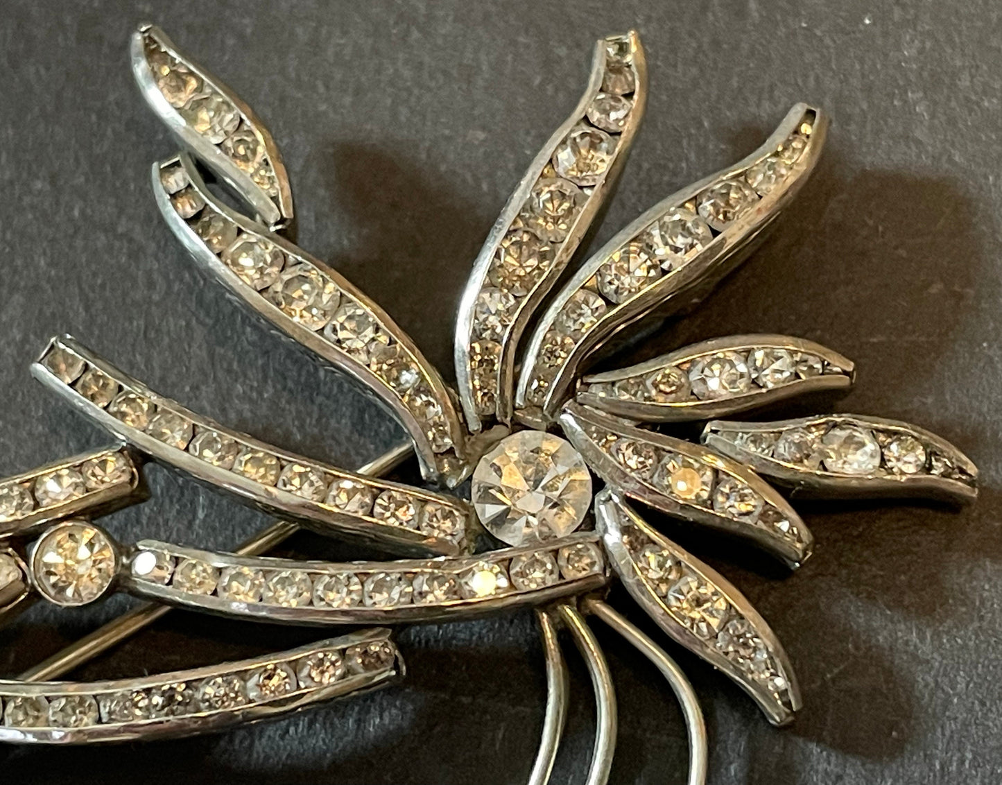 Huge vintage DRGM Schreiber & Hiller Art Deco channel set clear rhinestone and silver tone branch leaf flower machine age brooch (unsigned)