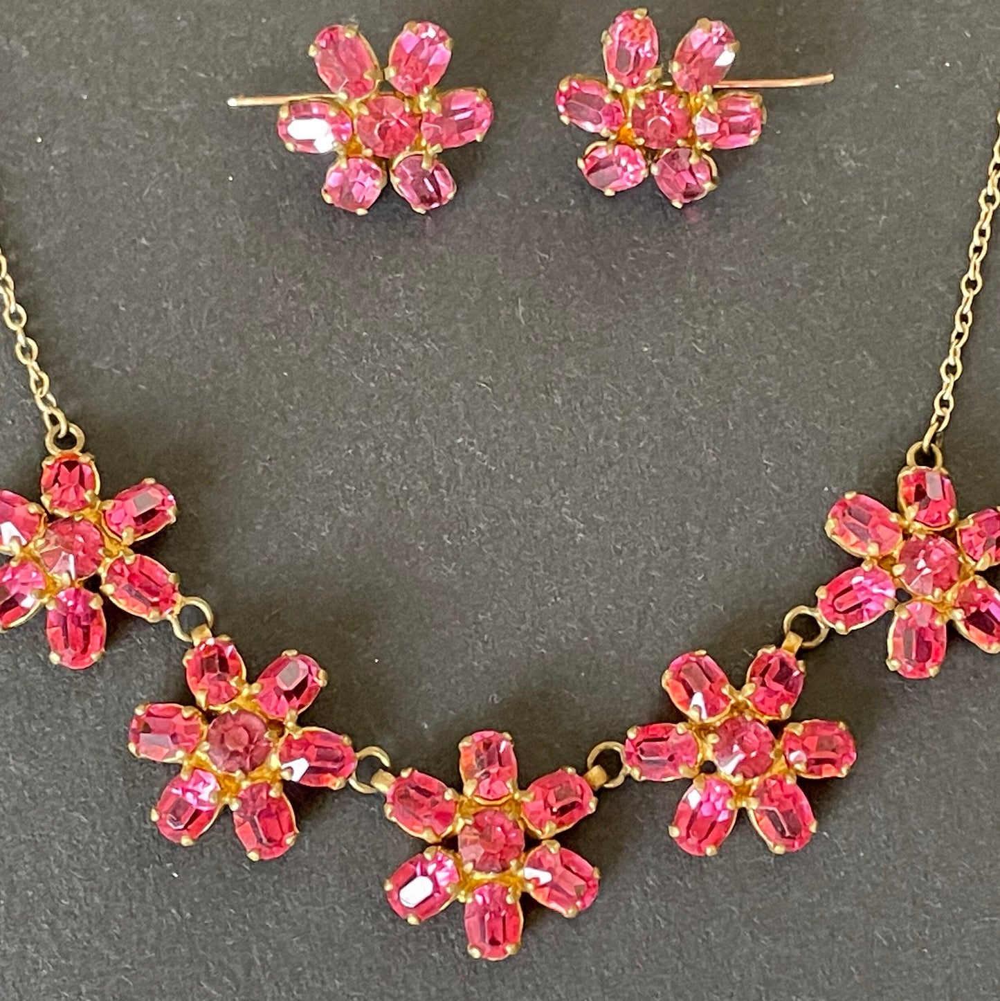 Vintage crystal floral design pink ruby coloured rhinestone necklace and earrings set- bright rhinestones set open-backed in gold tone