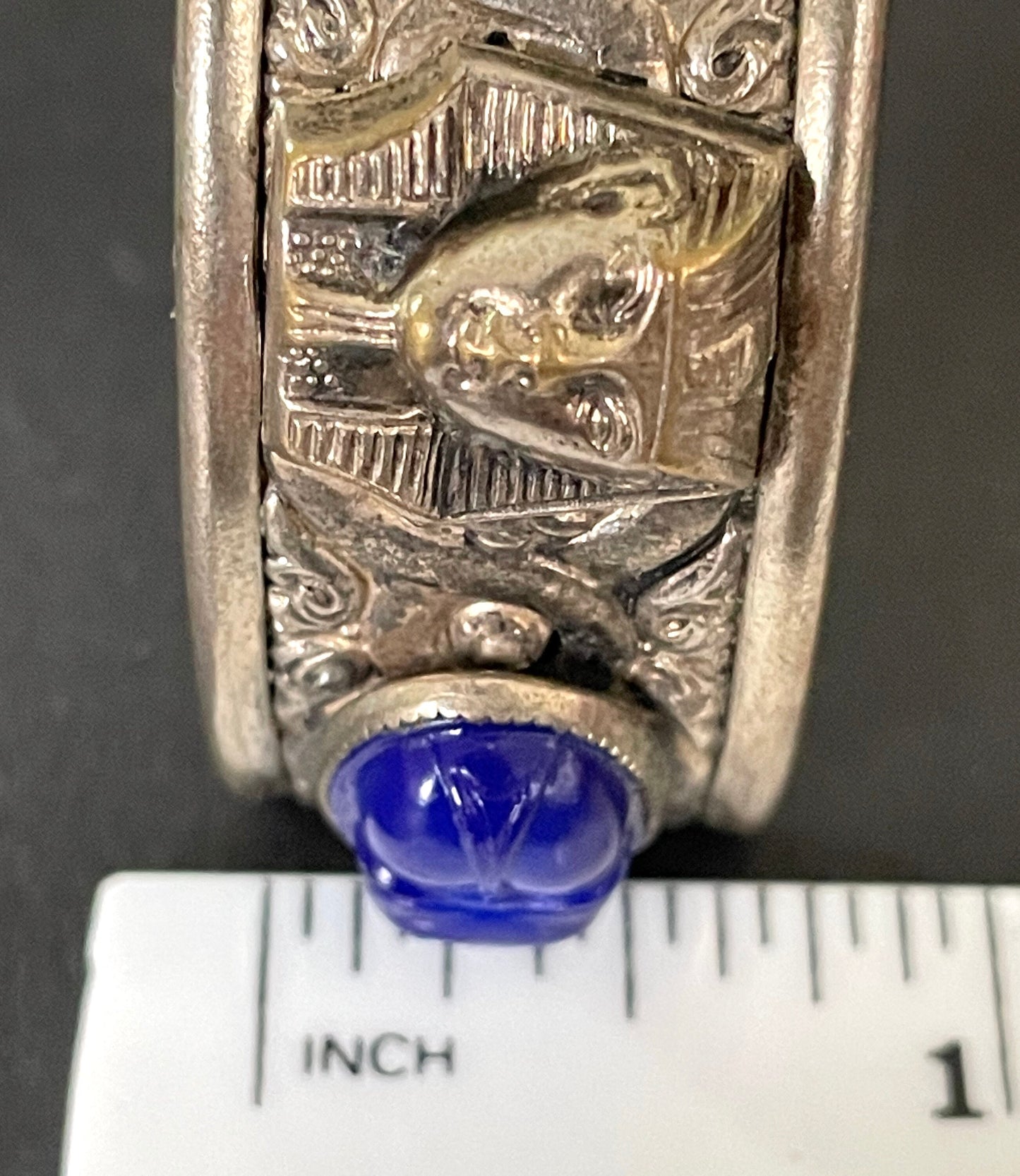 Vintage Egyptian revival Tutankhamun pharaoh and scarab beetle silver tone bangle, blue glass (faux lapis lazuli) scarab cabochons, Czech ?