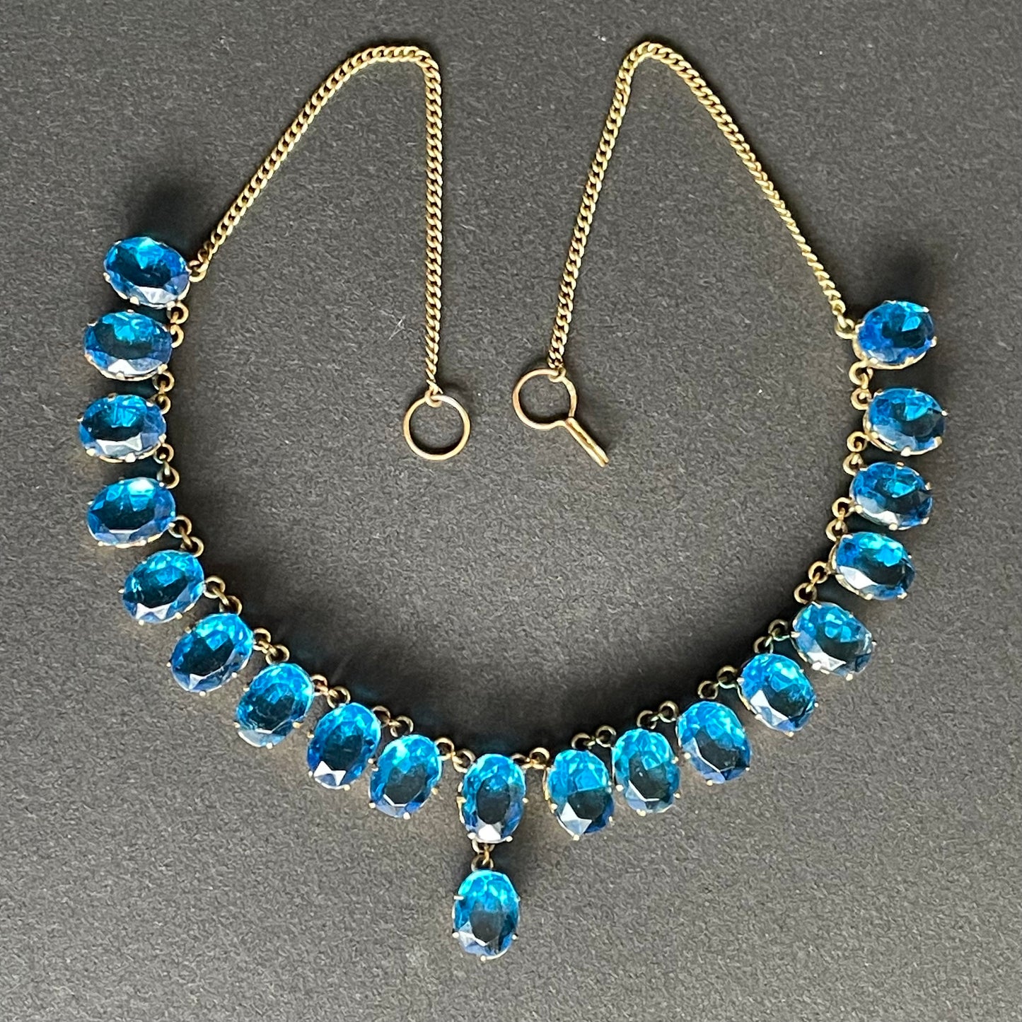 Antique Victorian bright sapphire blue paste riviere Y necklace, open backed large stones