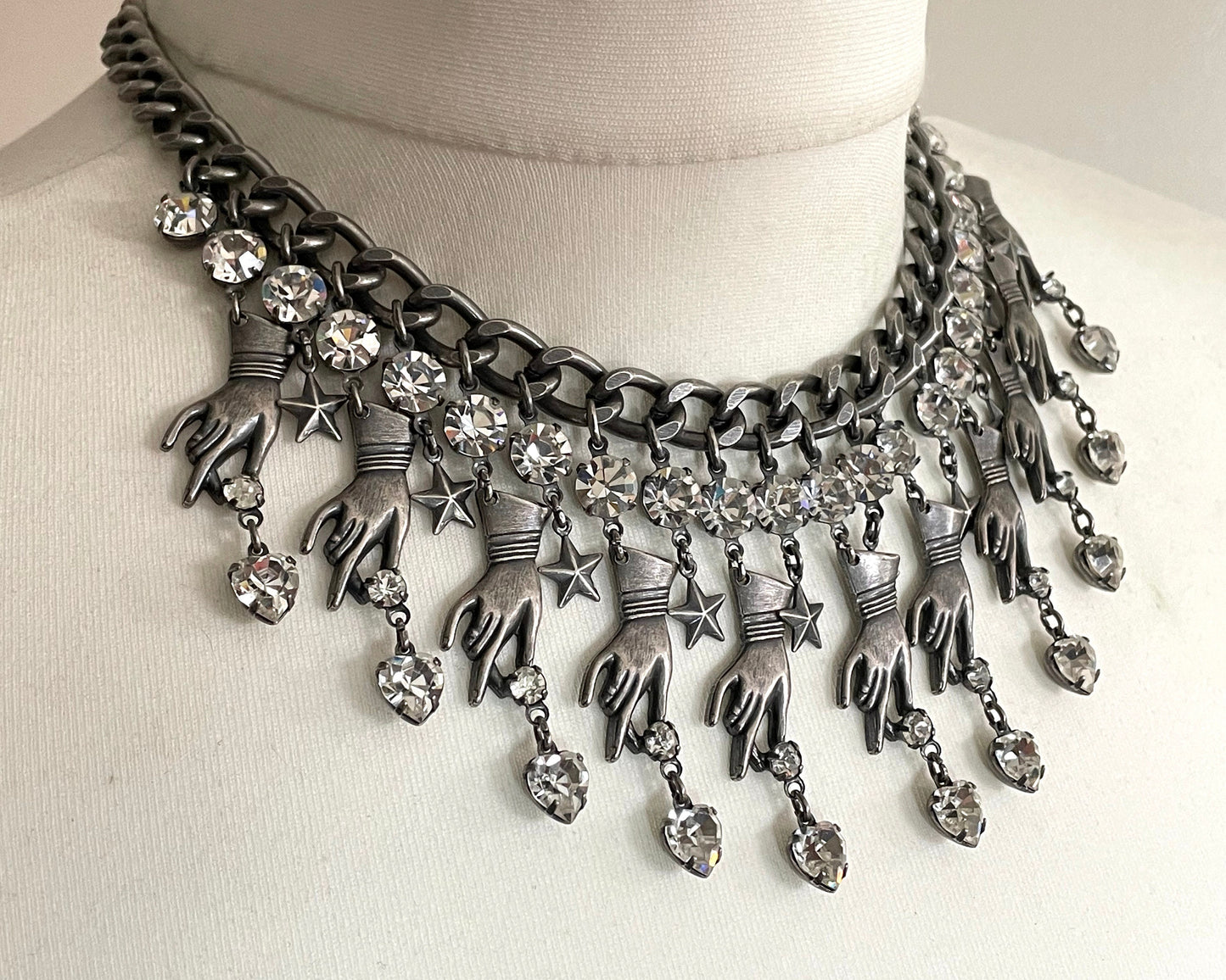 Vintage early Askew London hand, heart and star heavy fringe necklace, statement piece in chic dark silver tone & clear rhinestone, unique