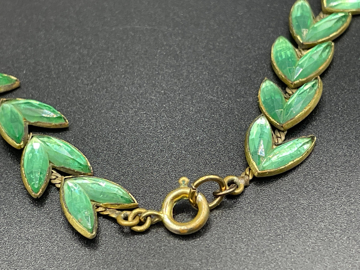 Vintage peridot green moulded Vauxhall style glass leaf design necklace, set in antique brassy gold tone