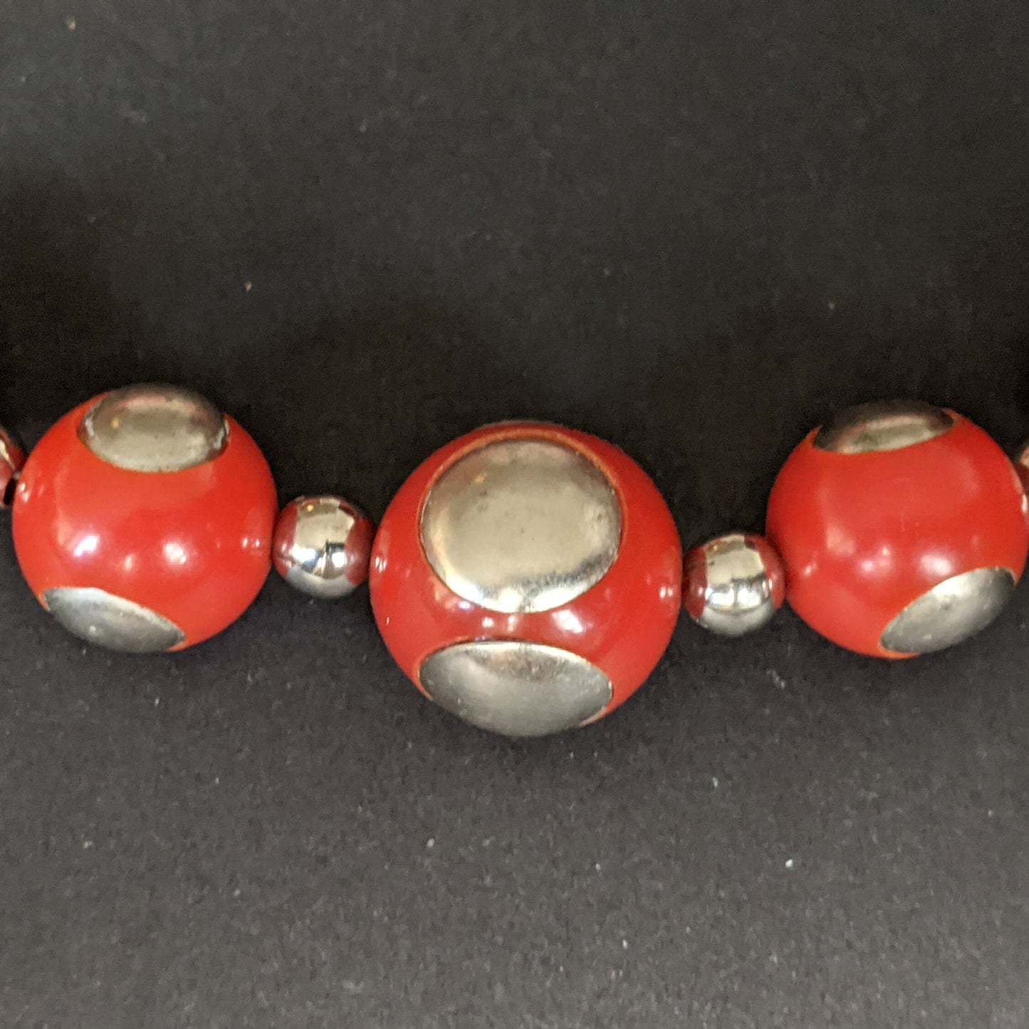 Vintage Art Deco machine age silver tone inset and large bright brick red early plastic, possibly galalith, bead chunky statement necklace