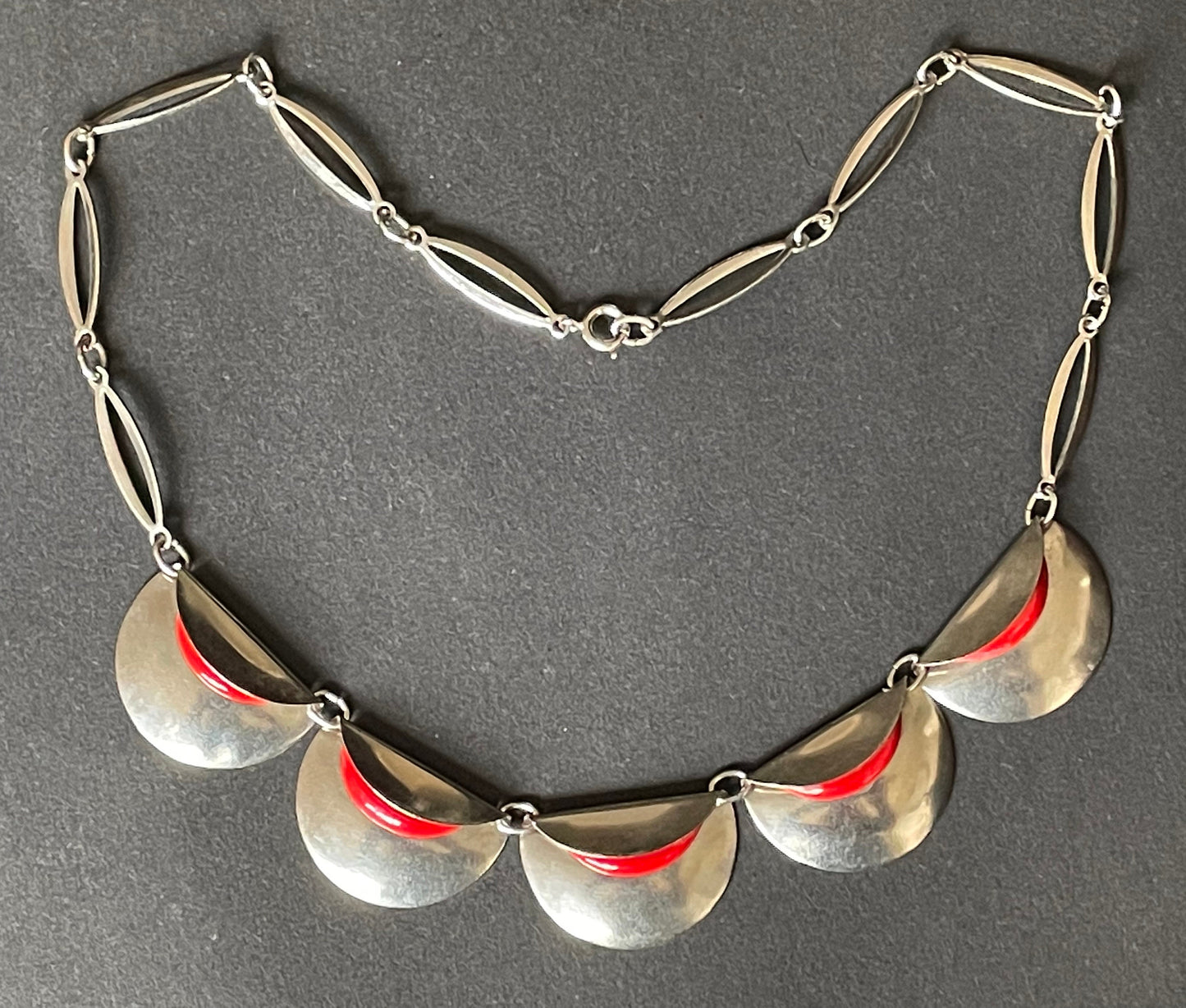 Vintage Jakob Bengel Art Deco machine age necklace, bright red galalith geometric shapes with shiny silver tone chrome folded discs