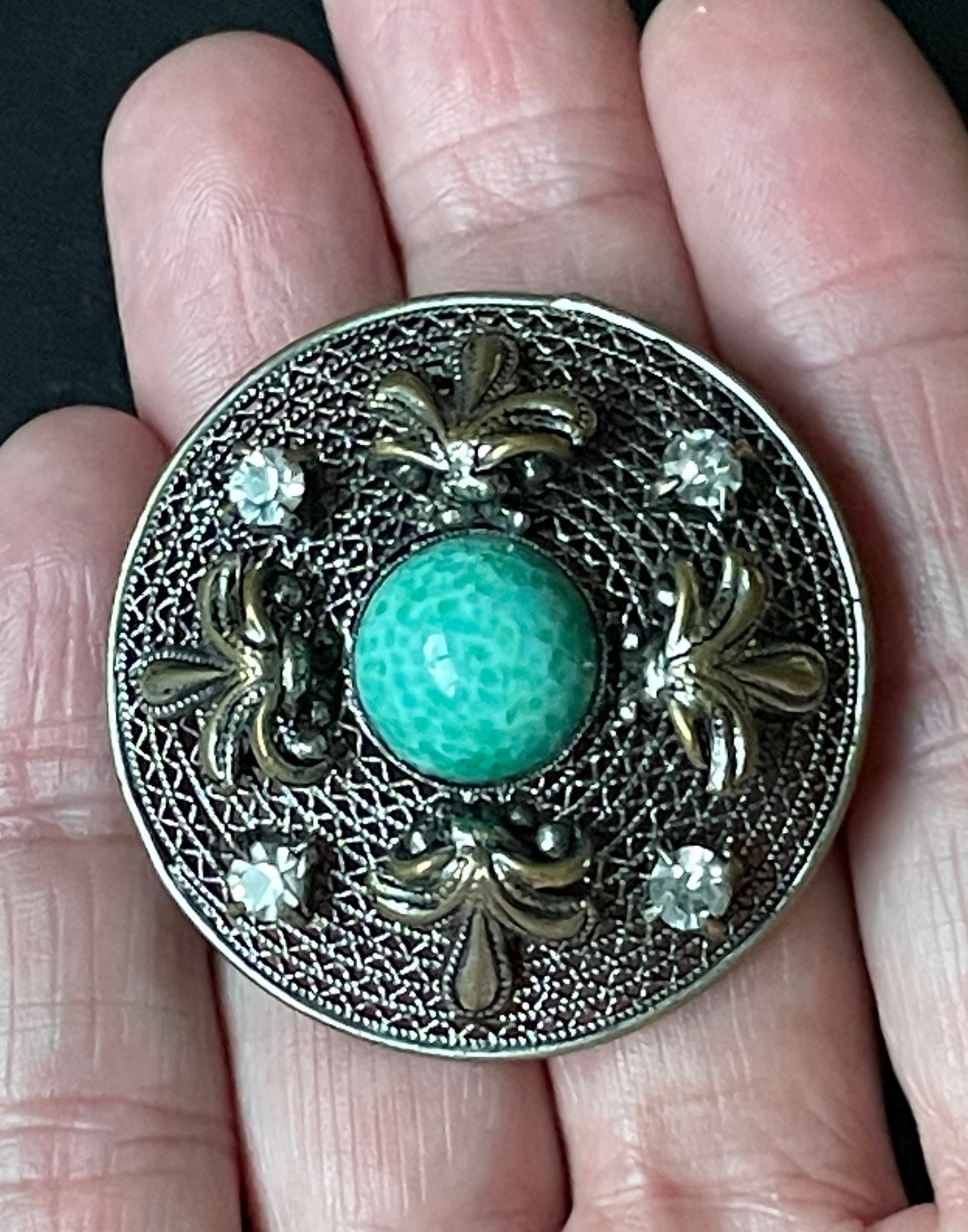 Vintage Czech or Chinese export style Art Deco green Peking glass cabochon and clear rhinestone brooch in silver tone filigree