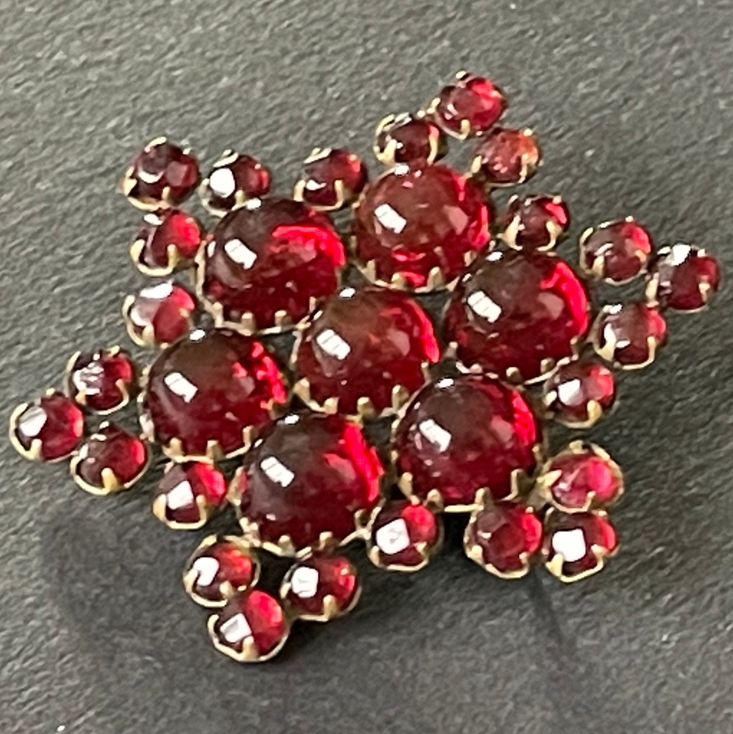 Vintage / antique Bohemian garnet star brooch, rose cut stones and cabochons set in yellow metal possibly gold, Victorian