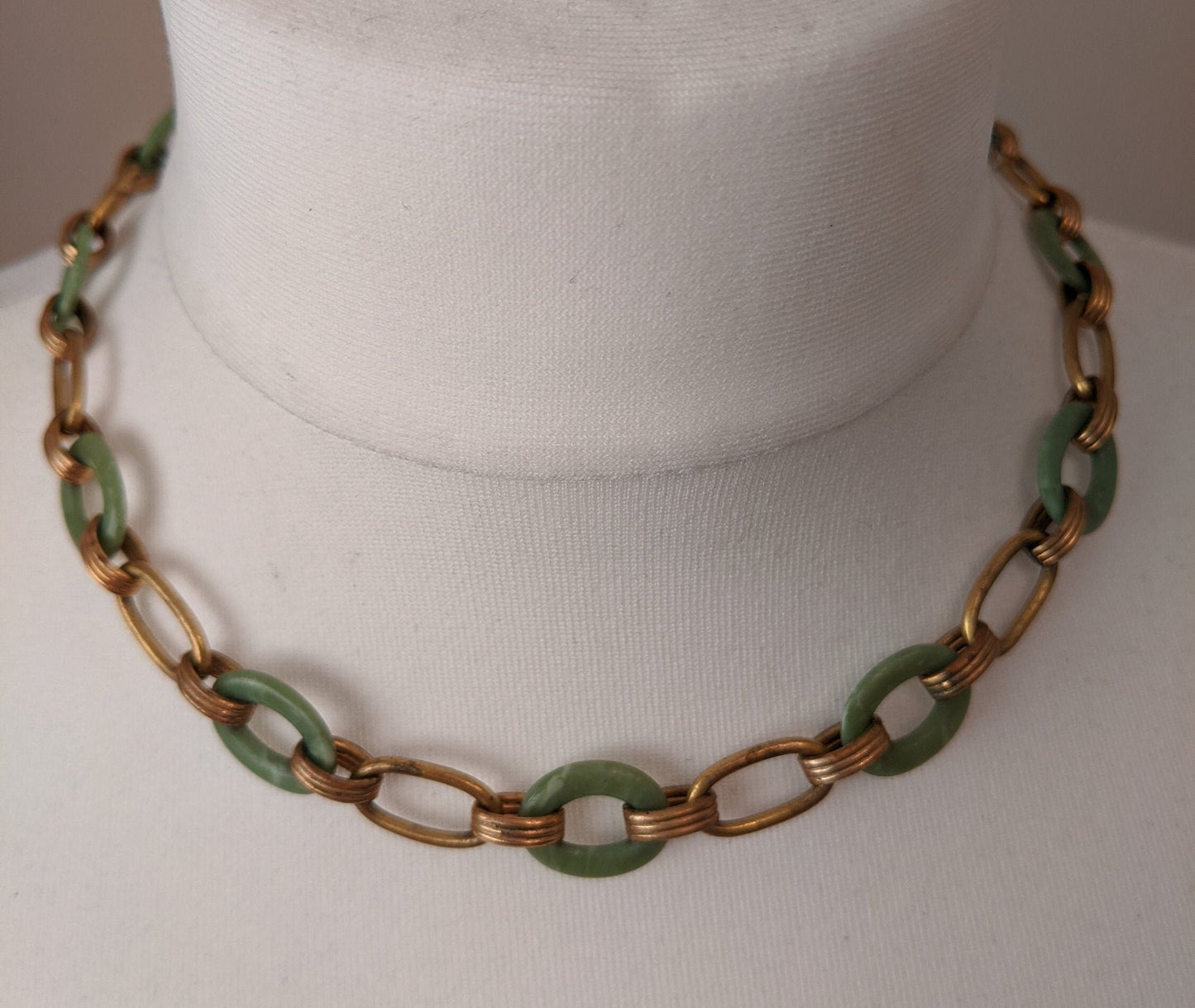 Vintage Jakob Bengel Art Deco machine age geometric gold tone and marbled green galalith ring necklace