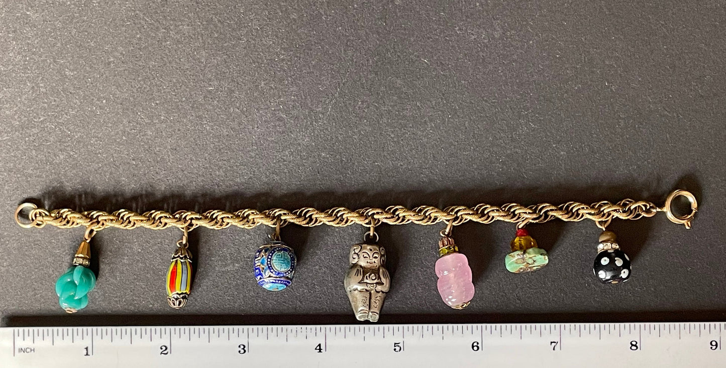 Vintage early Miriam Haskell charm bracelet or anklet with fancy gold tone rope chain and gorgeous Chinese bead and glass charms