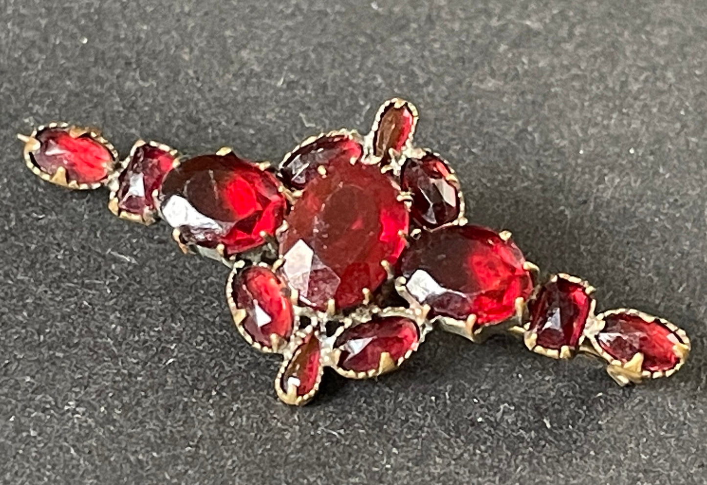 Vintage / antique Bohemian garnet brooch, different shaped stones set in gold tone, early Art Deco period 1920s