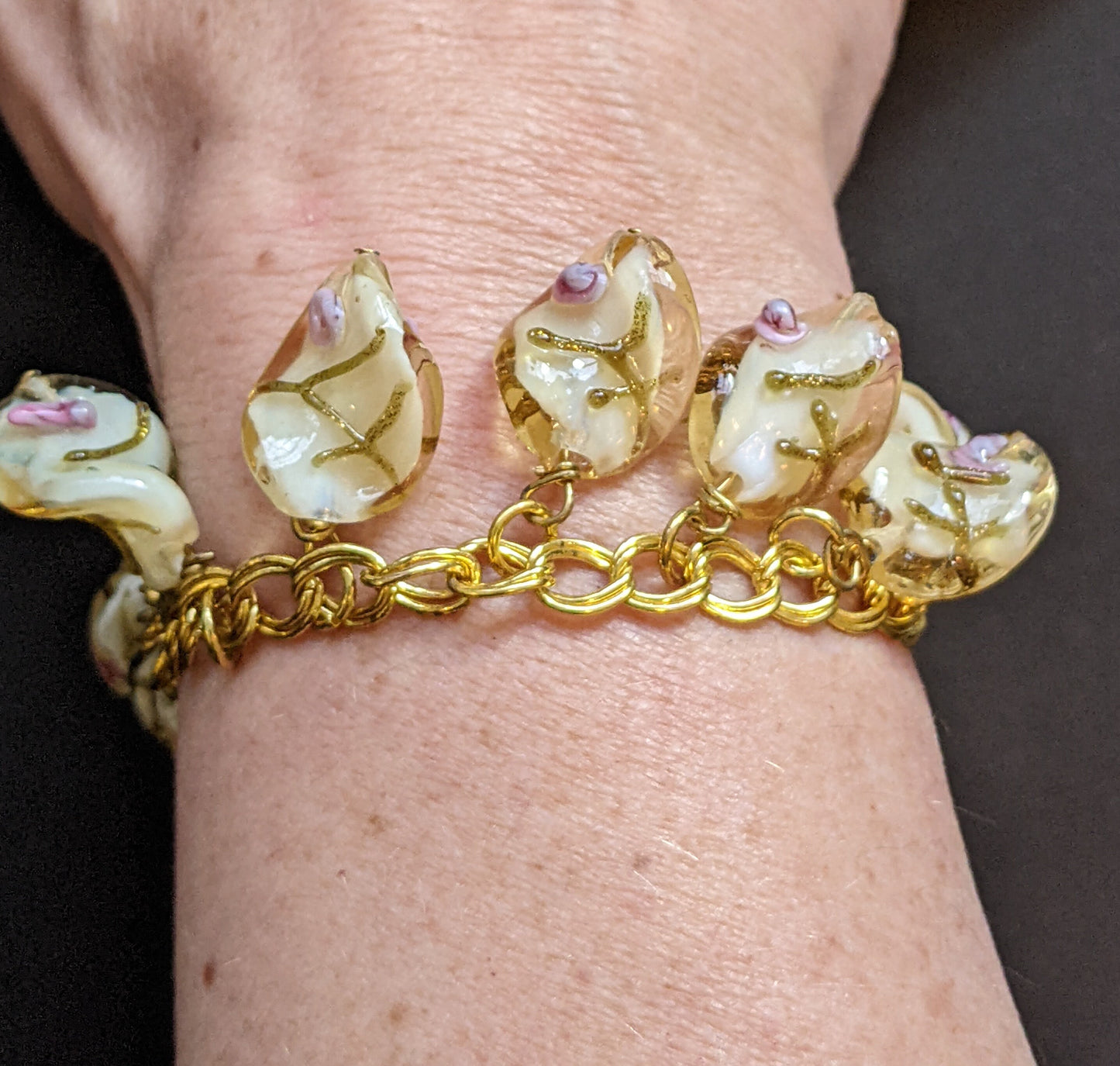 Vintage Art Deco Venetian wedding cake glass bead and gold tone charm bracelet, white, pink and gold, floral rose design, beautiful