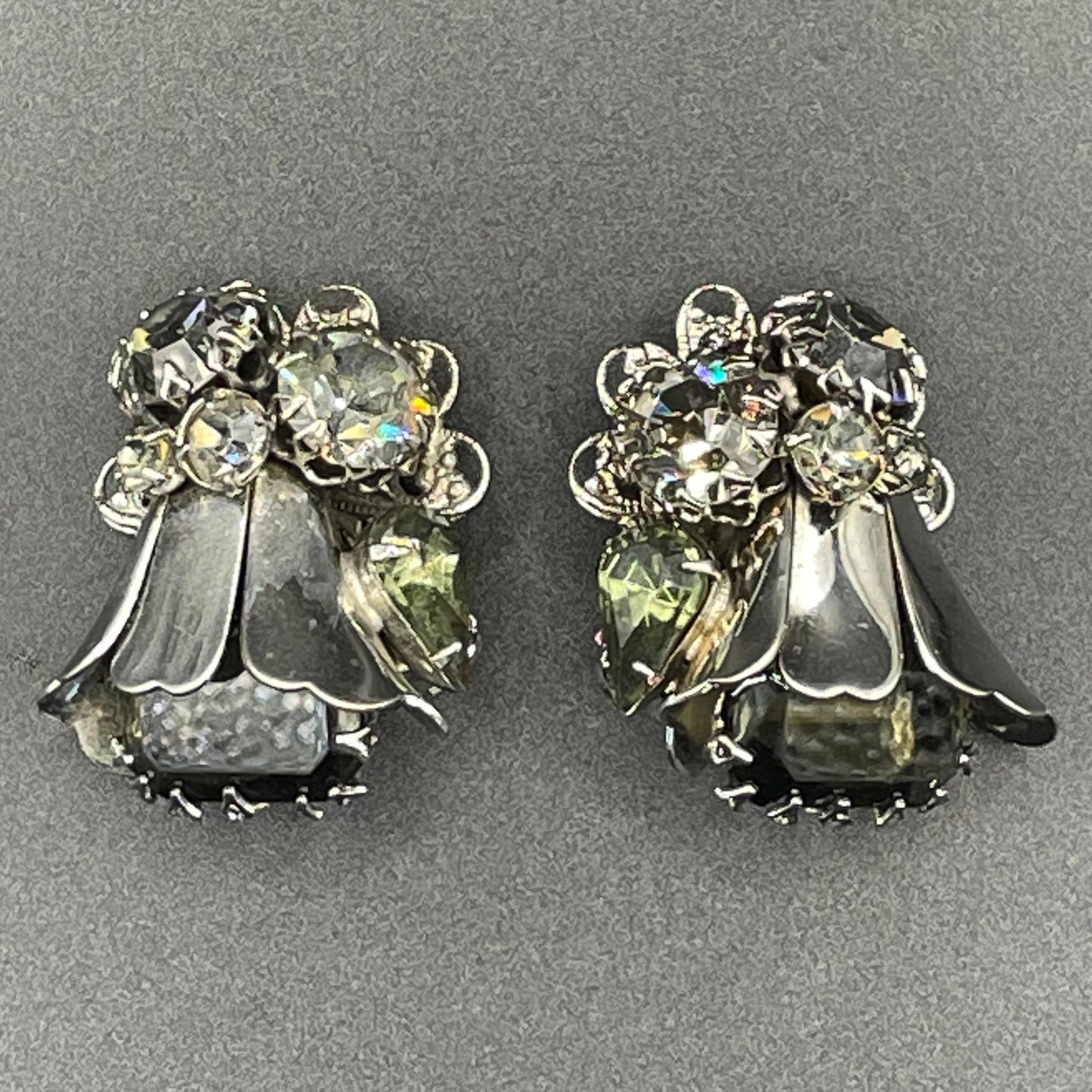 Vintage large rhinestone tulip flower design clip on earrings, silver tone with grey / green rhinestones and filigree backs