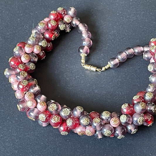 Heavy vintage pink, dark pink, purple and faux pearl glass bead cluster garland necklace with gold tone filigree bead caps and screw clasp