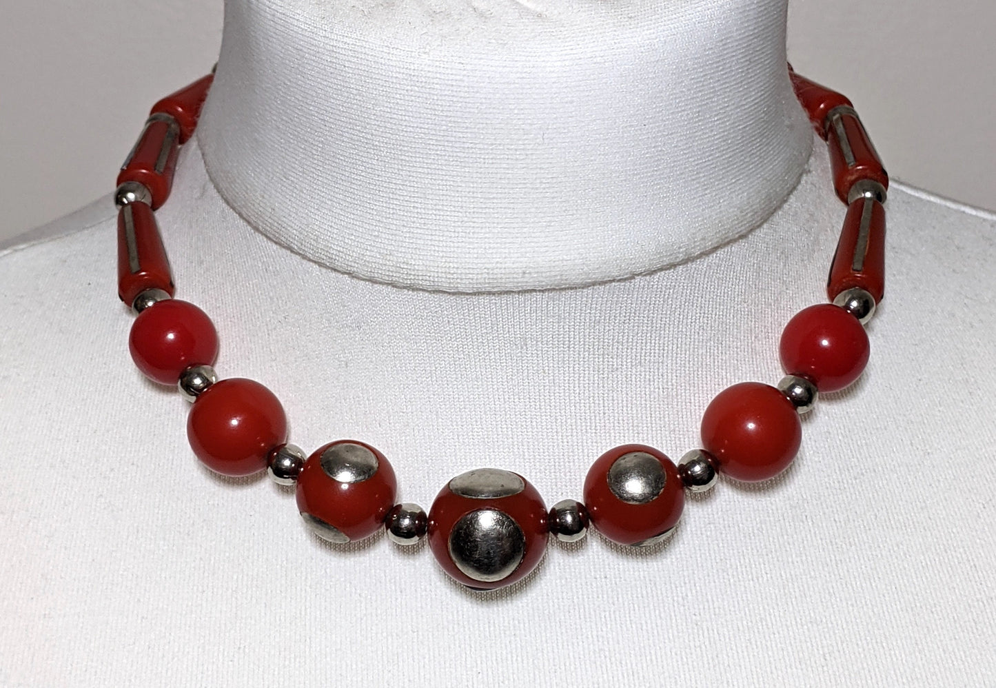 Vintage Art Deco machine age silver tone inset and large bright brick red early plastic, possibly galalith, bead chunky statement necklace