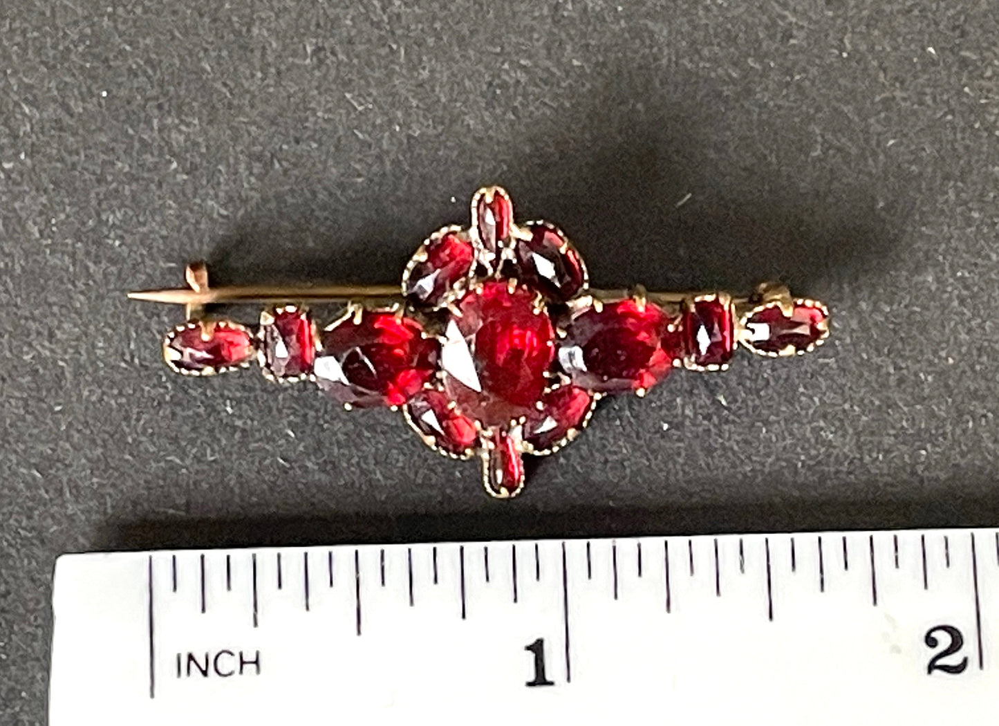 Vintage / antique Bohemian garnet brooch, different shaped stones set in gold tone, early Art Deco period 1920s