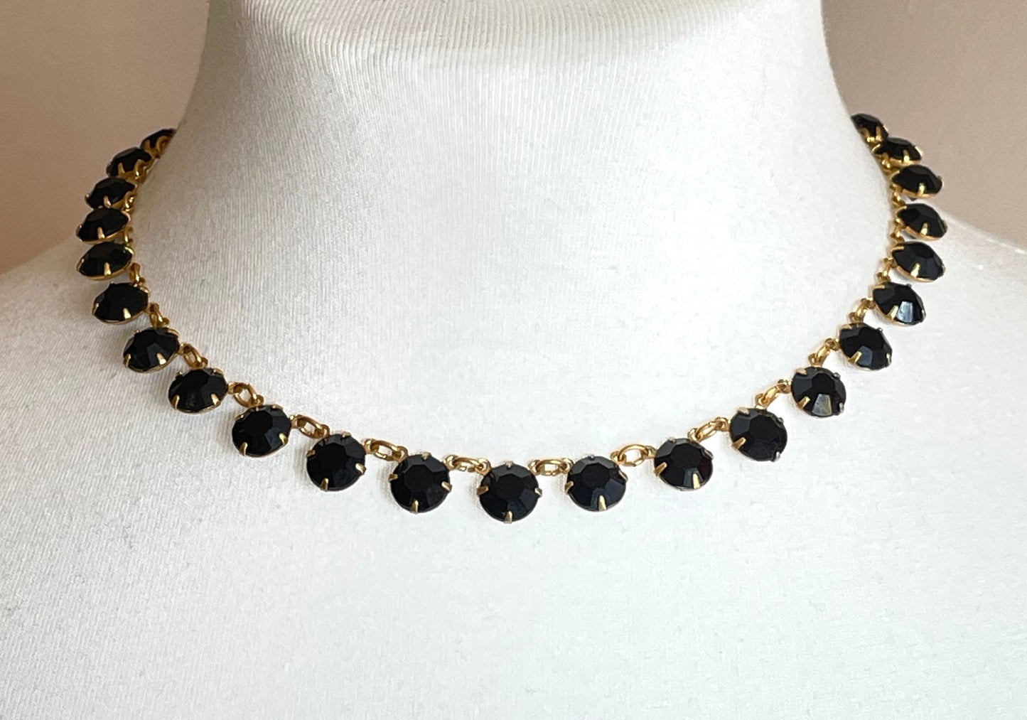 Vintage Art Deco black French jet crystal riviere necklace, single strand, bezel set, open backed rhinestones in gold tone