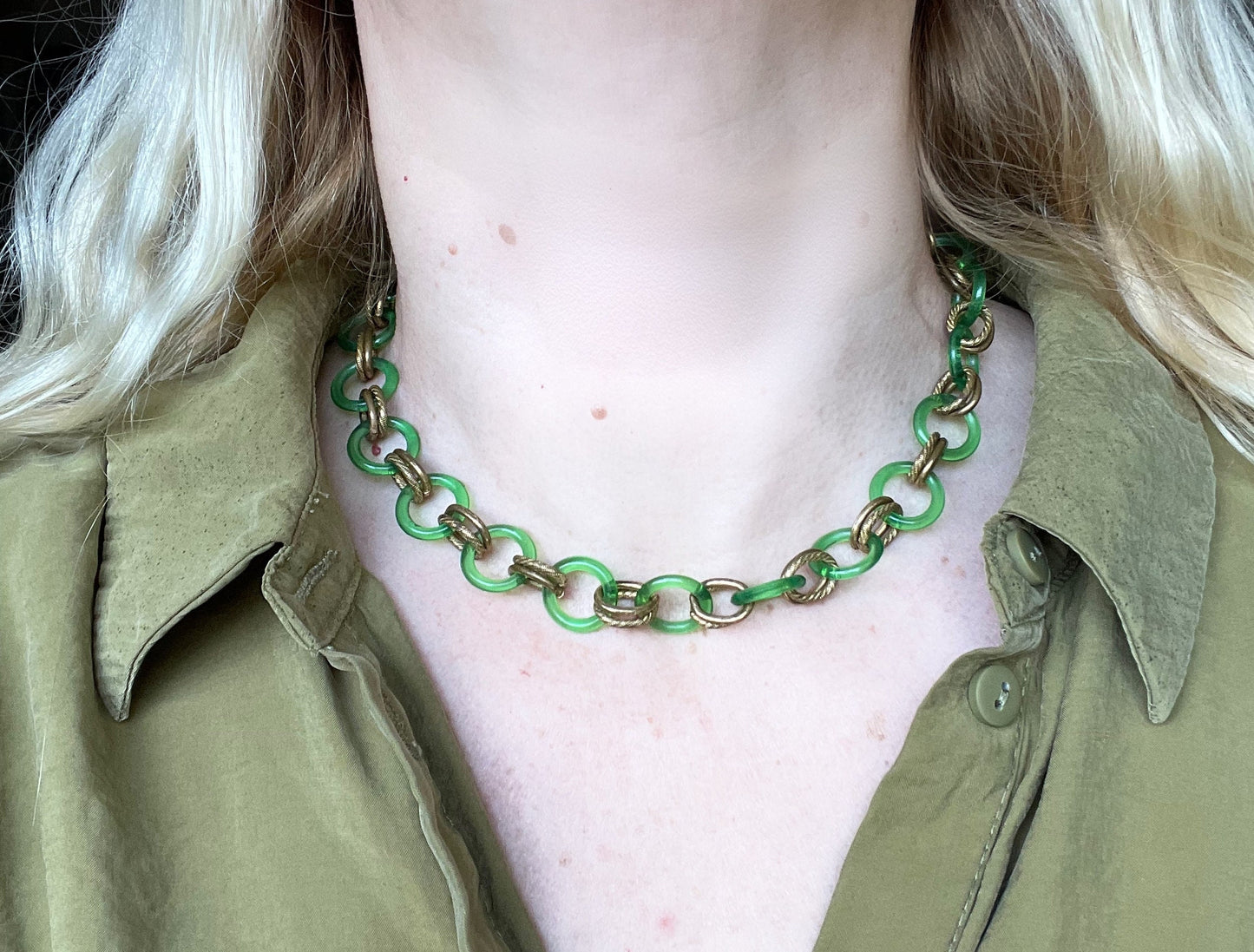 Vintage Jakob Bengel Art Deco 1930s machine age collar necklace with early plastic transparent green circles, antique gold tone links