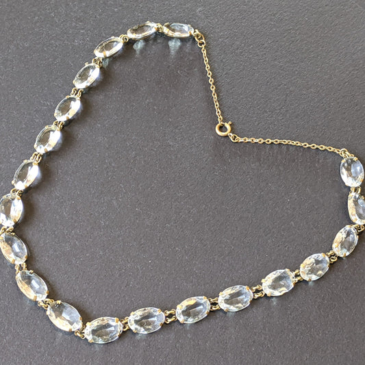 Vintage Art Deco clear paste large oval crystal riviere necklace, bezel set open backed Czech crystal stones set in gold tone