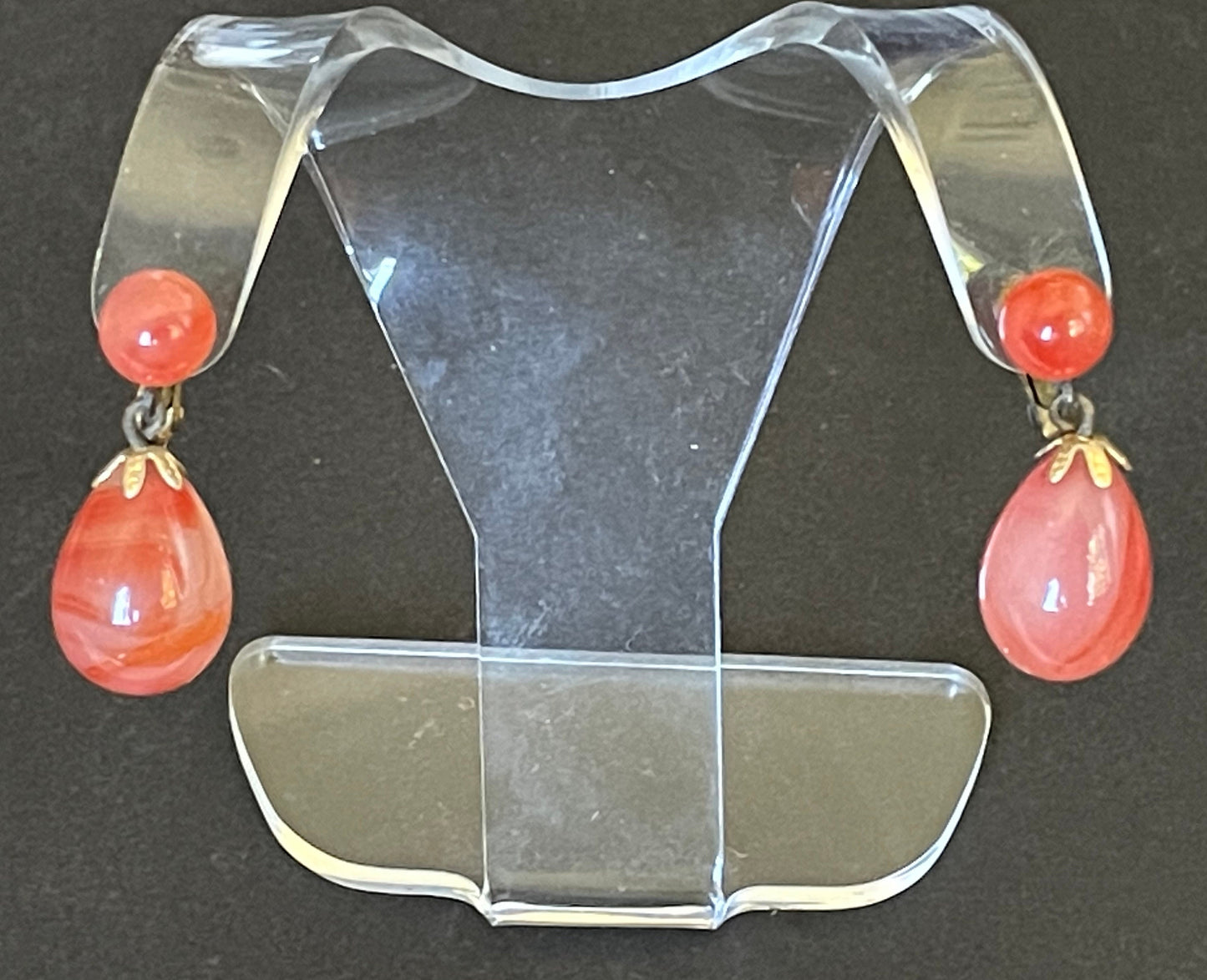 Vintage Art Deco large teardrop glass faux carnelian and gold tone statement clip on earrings, stamped ges gescht