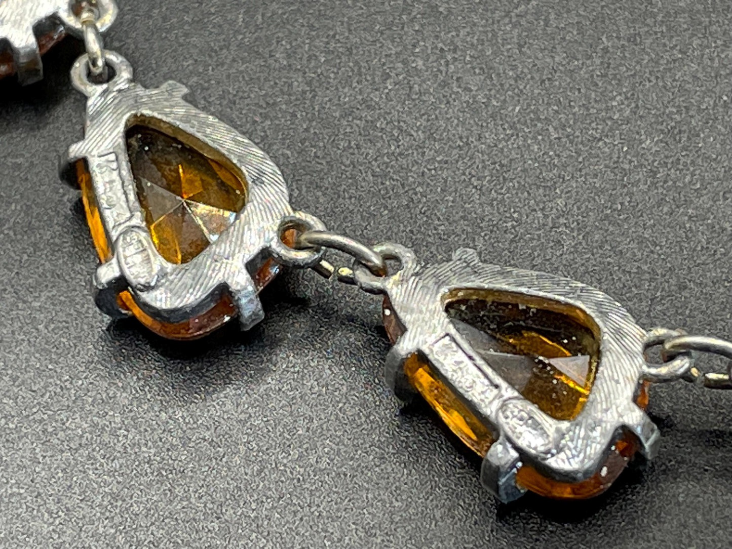 Vintage signed Sphinx citrine yellow / topaz orange glass riviere necklace, triangle shaped crystals set open-backed in silver tone settings