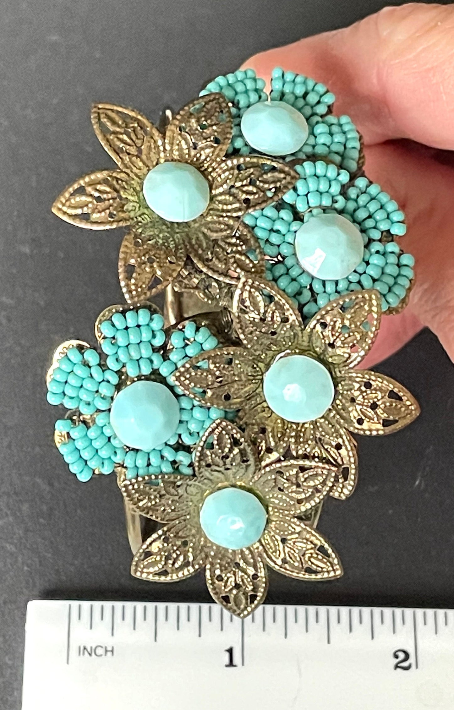 Vintage early Miriam Haskell turquoise blue glass beaded floral clamper bangle with intricate micro beading and gold tone filigree