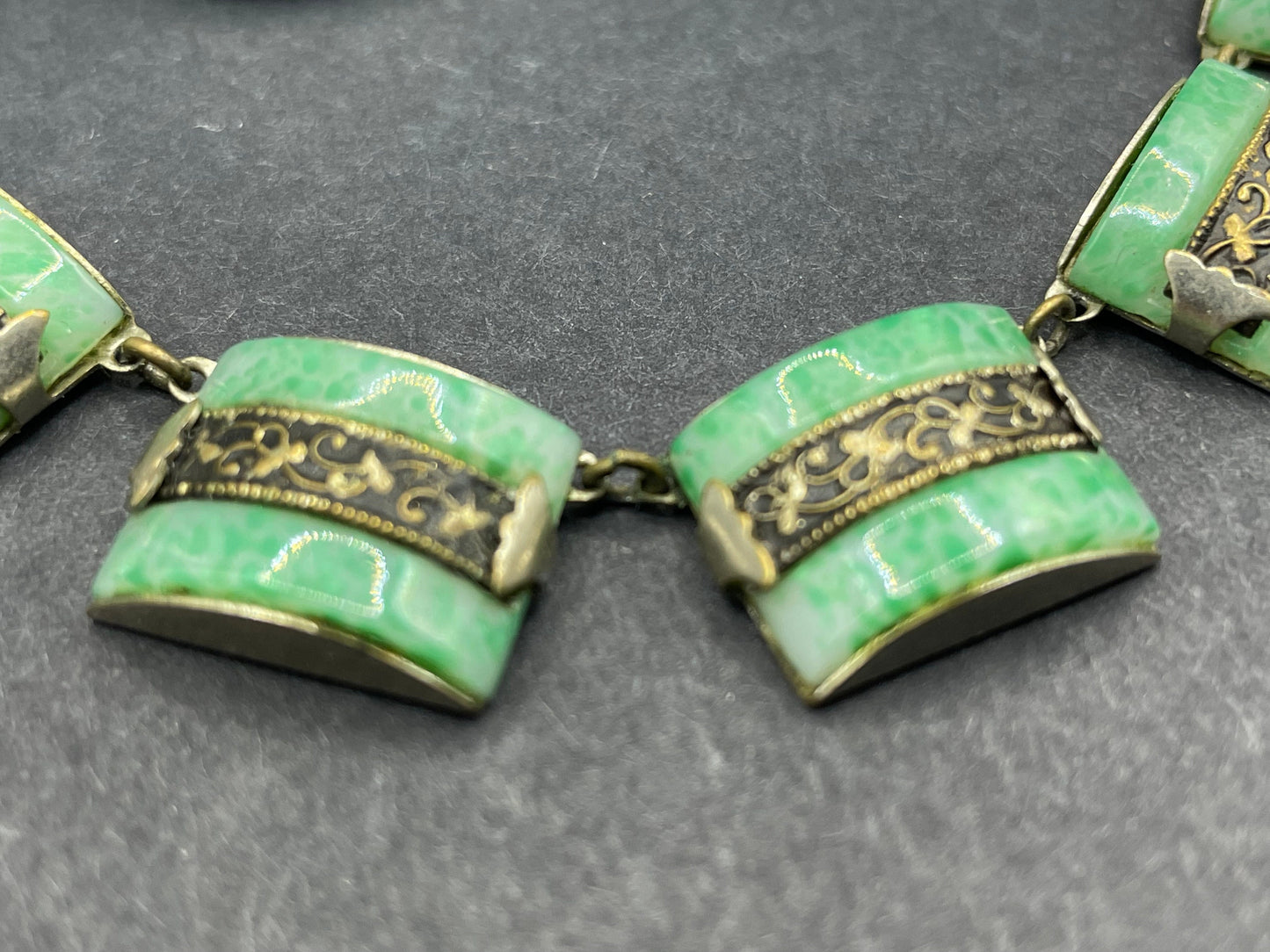 Vintage Art Deco machine age chrome silver tone and brass gold tone, green 'Peking' style glass necklace and screw back earrings set