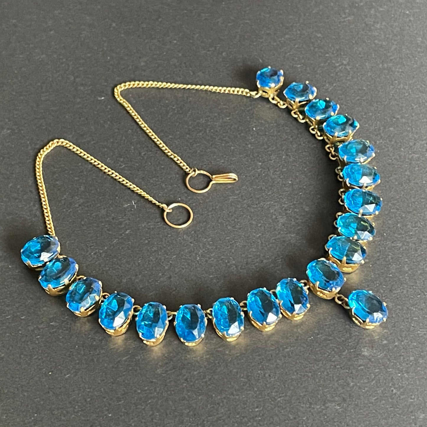 Antique Victorian bright sapphire blue paste riviere Y necklace, open backed large stones