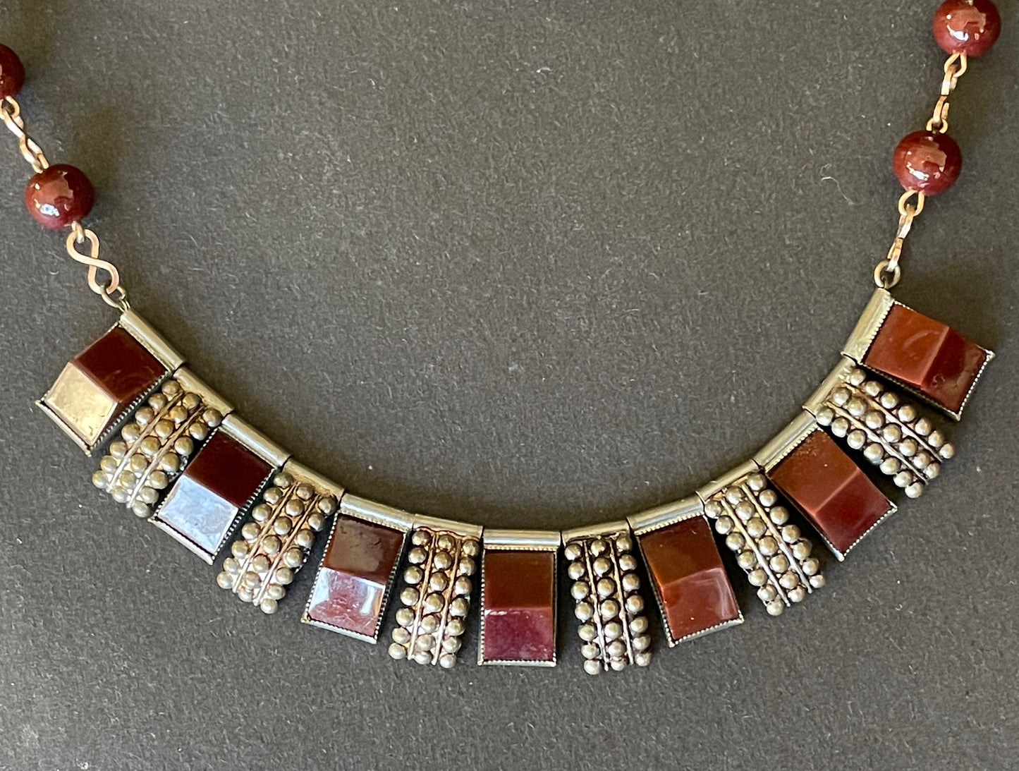 Vintage Art Deco machine age silver tone and rolled gold, brown / burgundy glass necklace